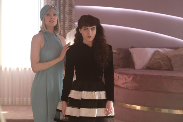 Evan Rachel Wood as Liz Schaffer Ivy Wolk as Rhonda stand in front of a mirror in episode 7 of The Shards.